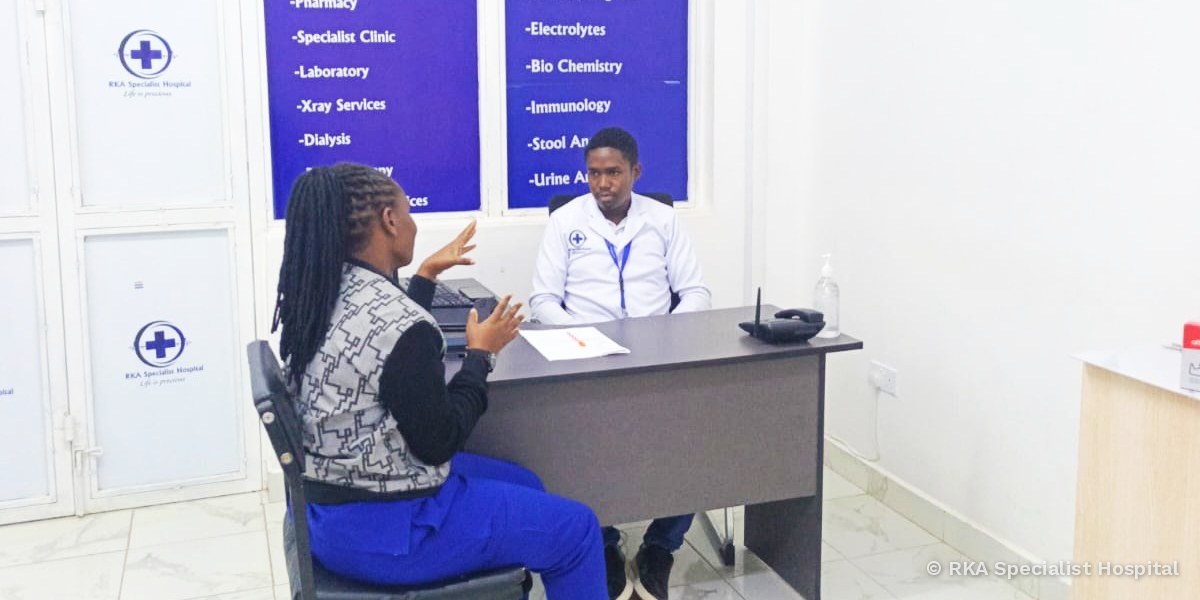 A counsellor listening to a client during a session at RKA Specialist Hospital
