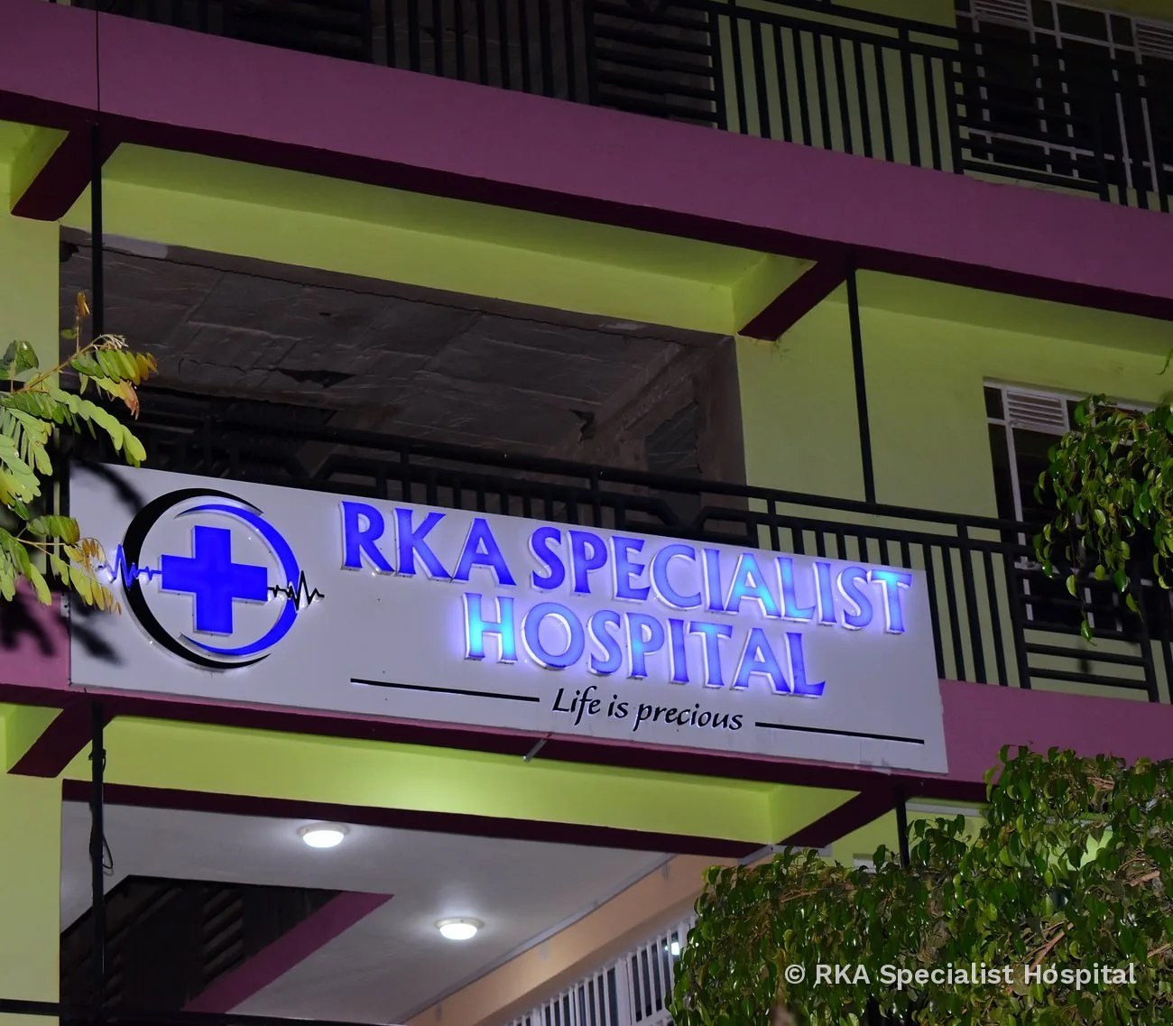 RKA Specialist Hospital signage lit up at night