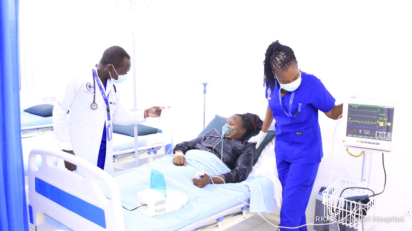 A doctor and nurse attending to a patient at RKA Specialist Hospital