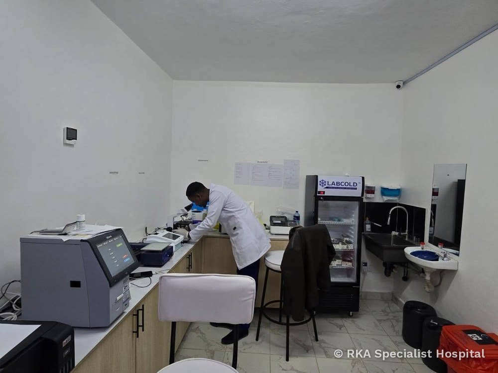 A laboratory technologist conducting tests at RKA Specialist Hospital