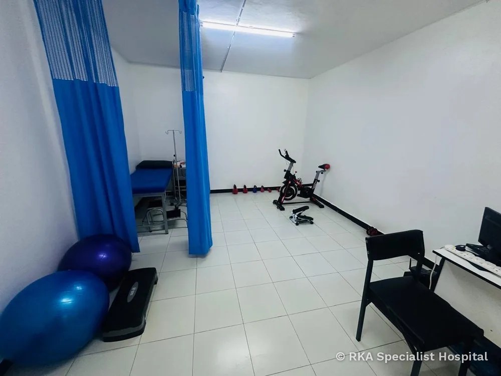 Physiotherapy room with exercise balls and mats at RKA Specialist Hospital